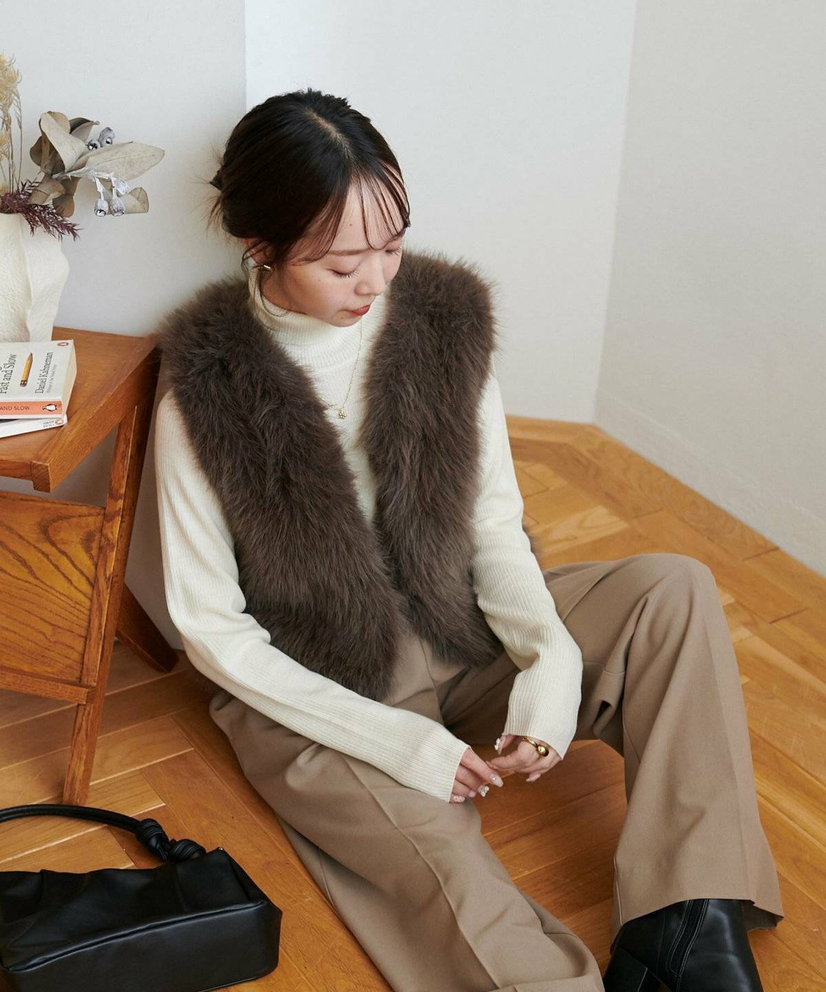 ファーベストを重ねた女性