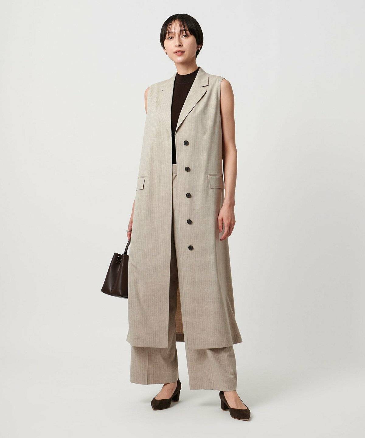 秋コーデの女性