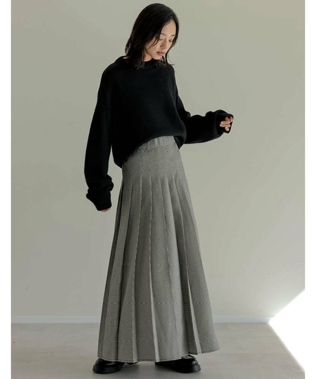 秋コーデの女性