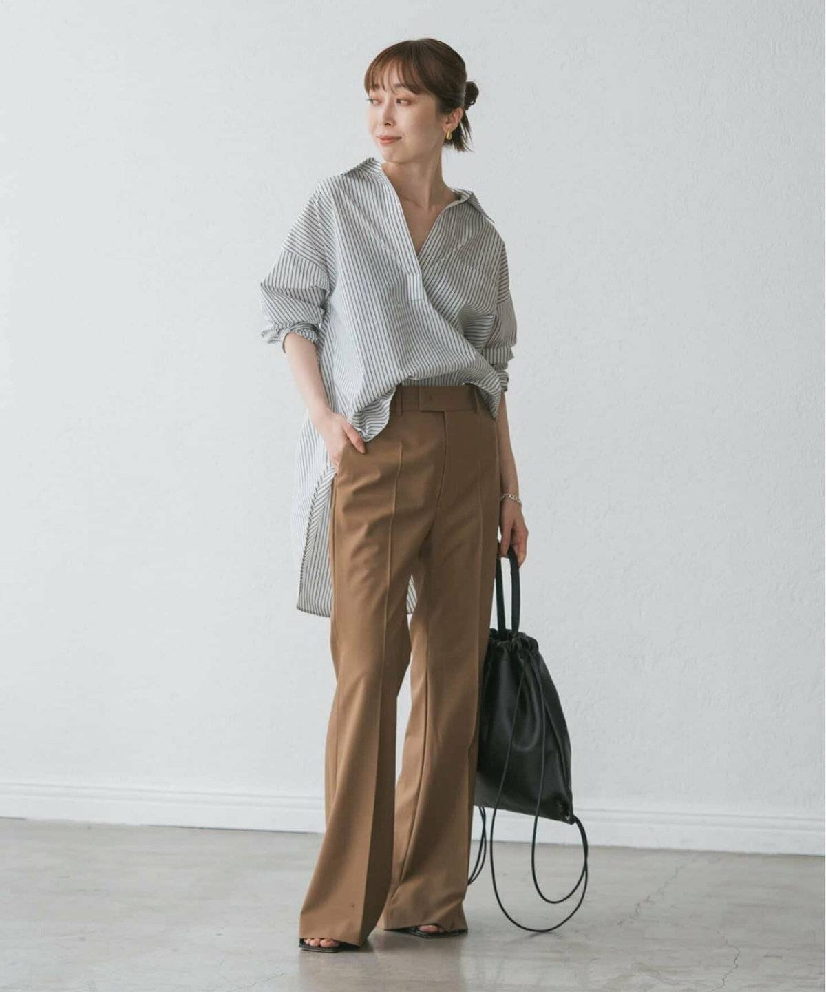 秋コーデの女性