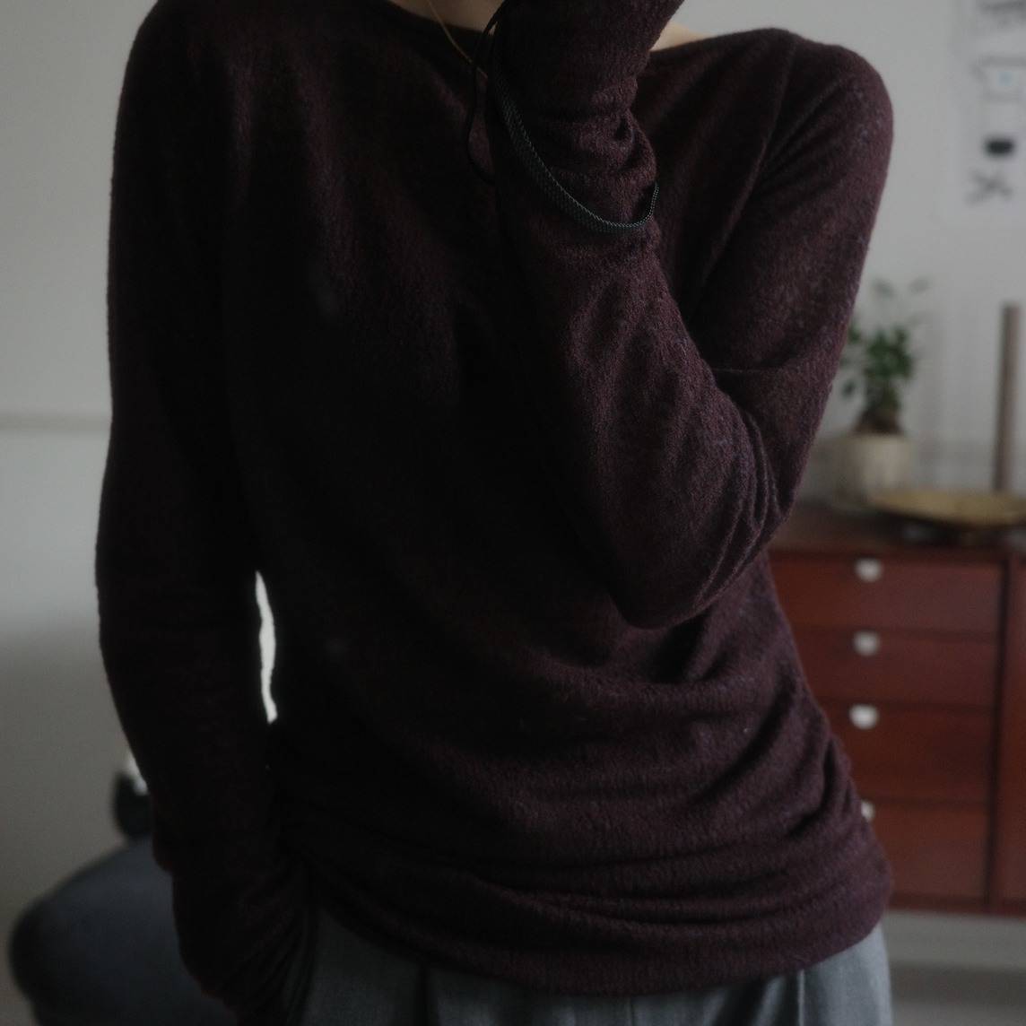 CONSISTERの「WOOL LACY TOP」