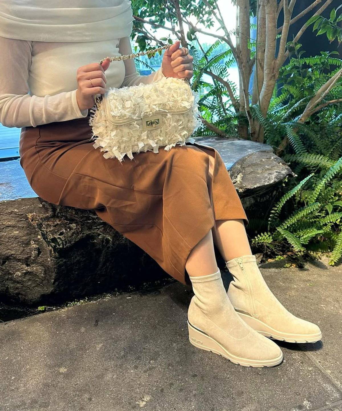 ブーツを履いた女性