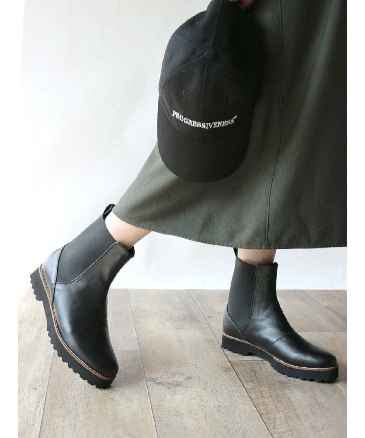 ブーツを履いた女性