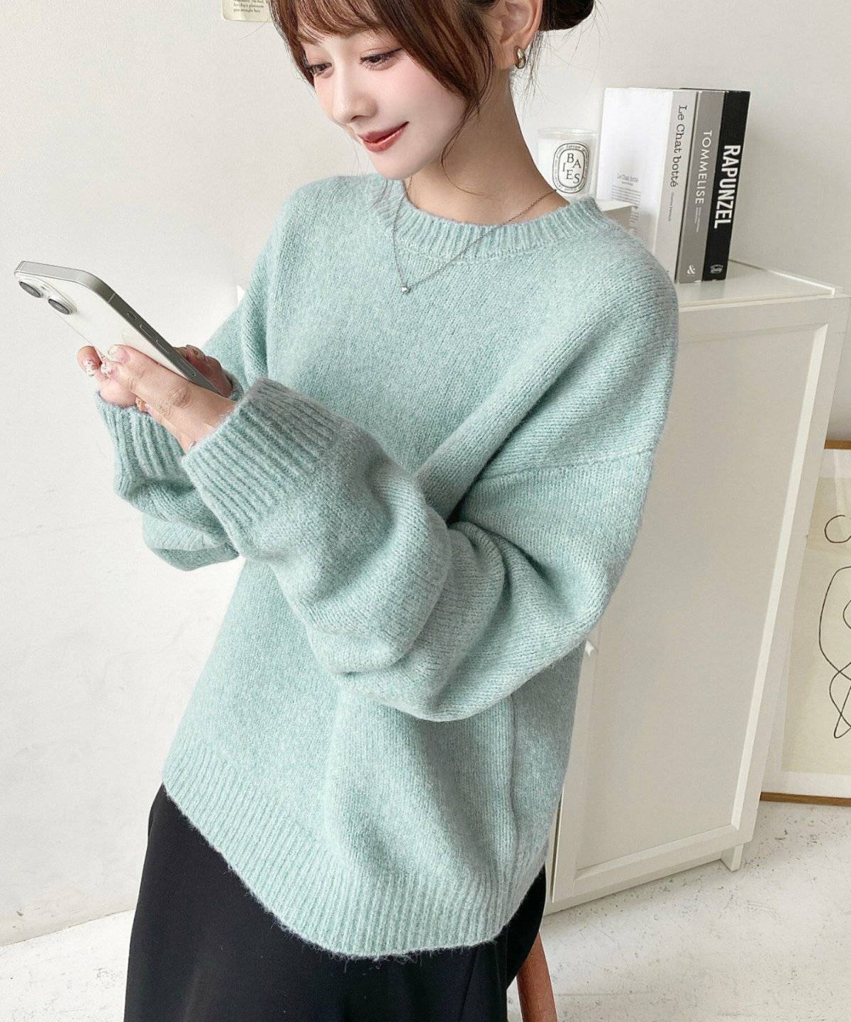 秋コーデの女性