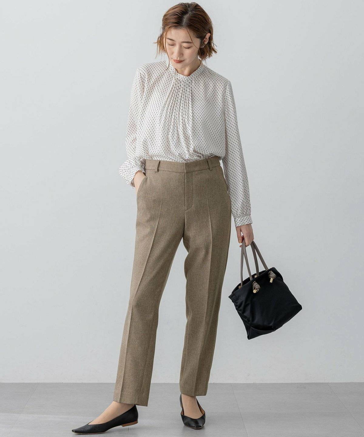 秋コーデの女性