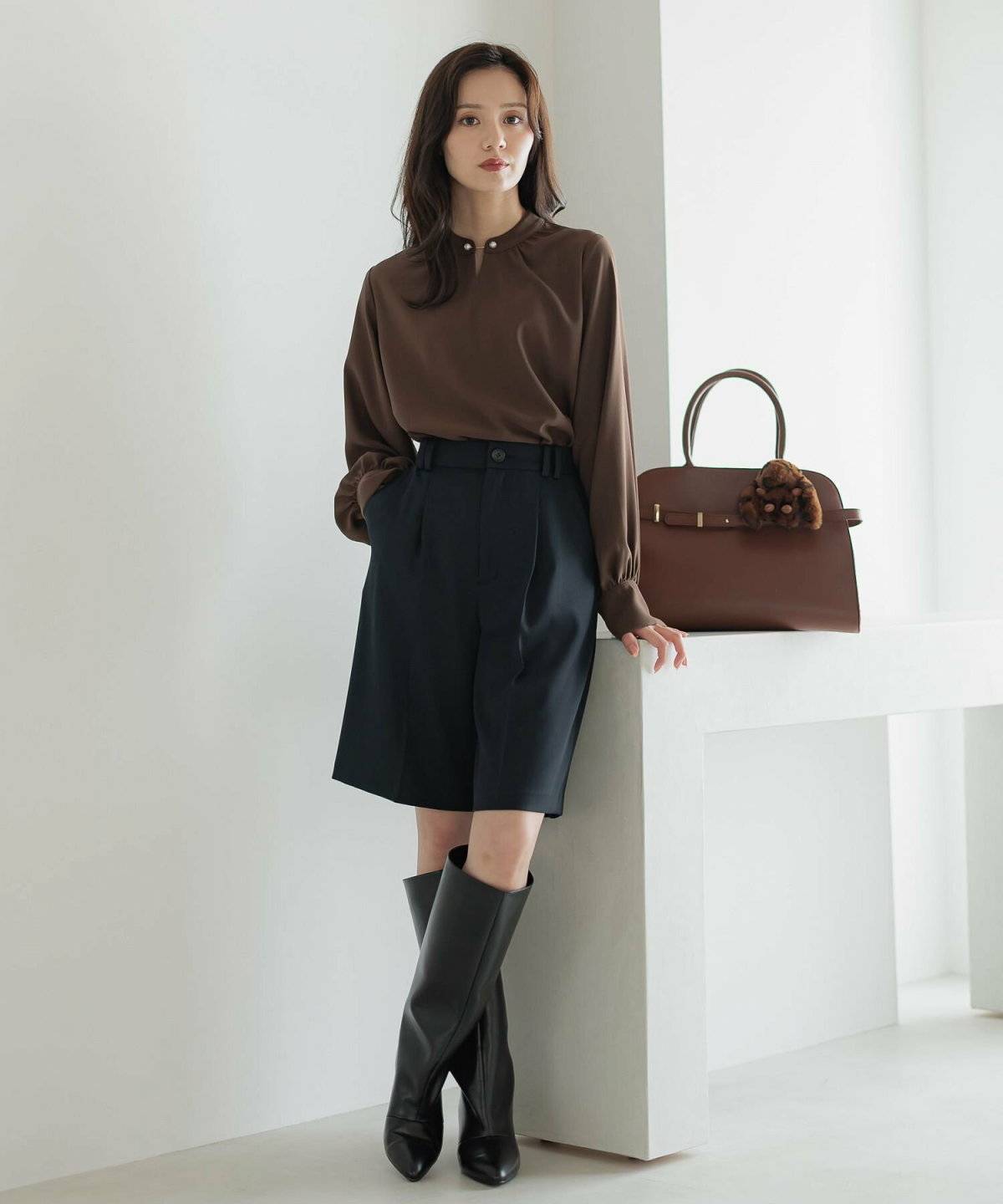 秋コーデの女性