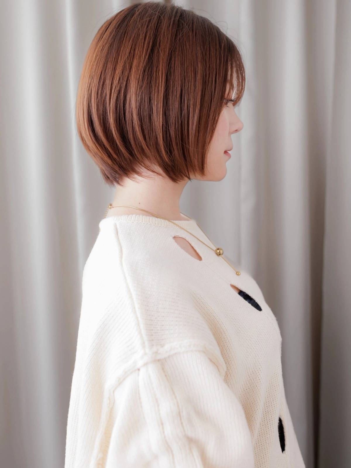 オレンジベージュのまとまりボブ