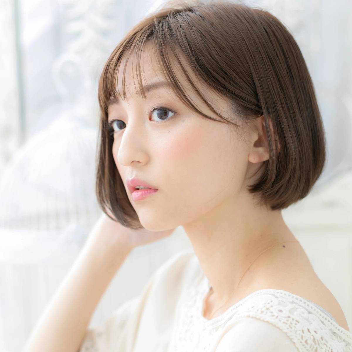 耳掛け丸みボブ