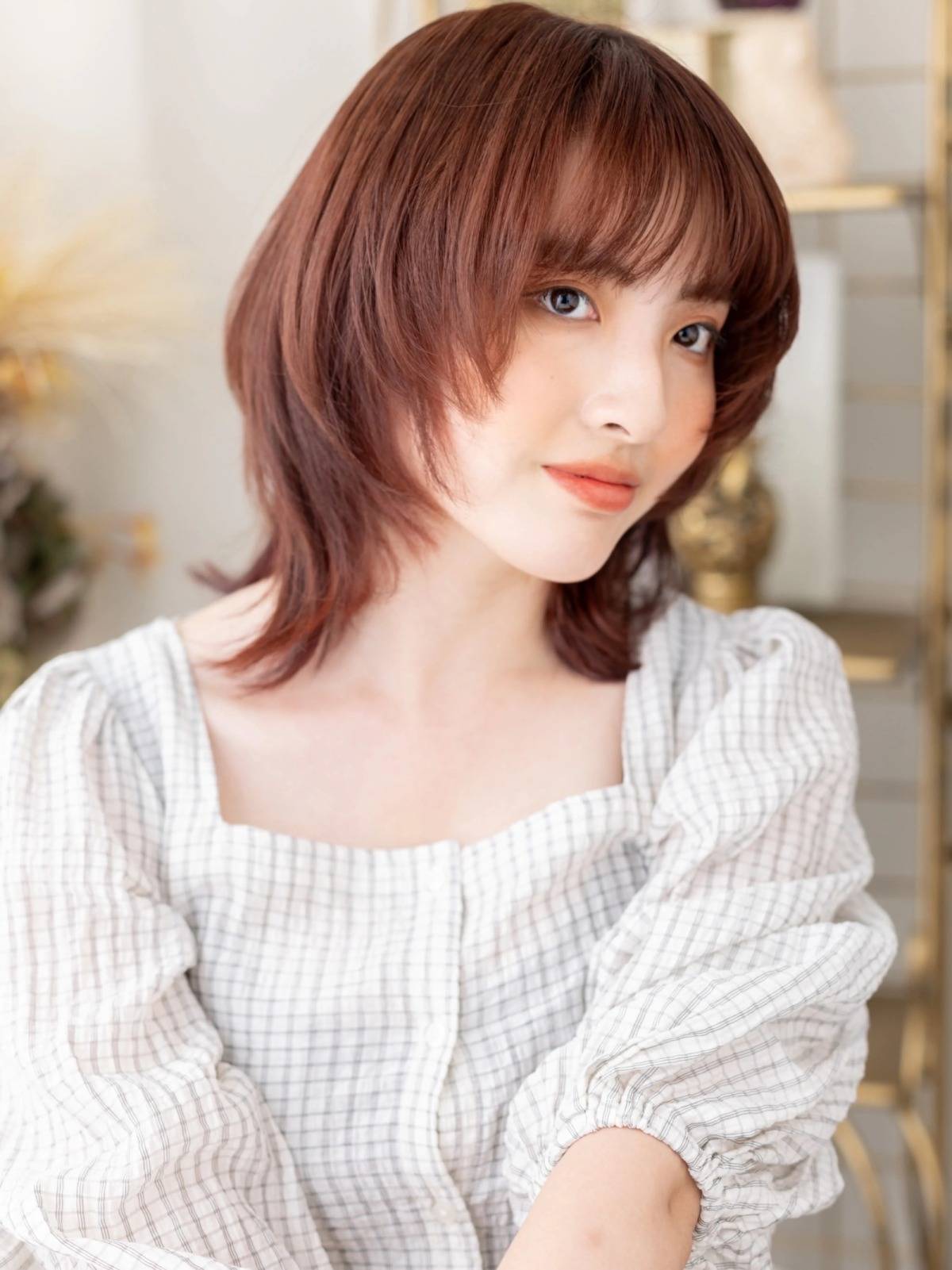 ツヤカラーのひし形くびれボブ