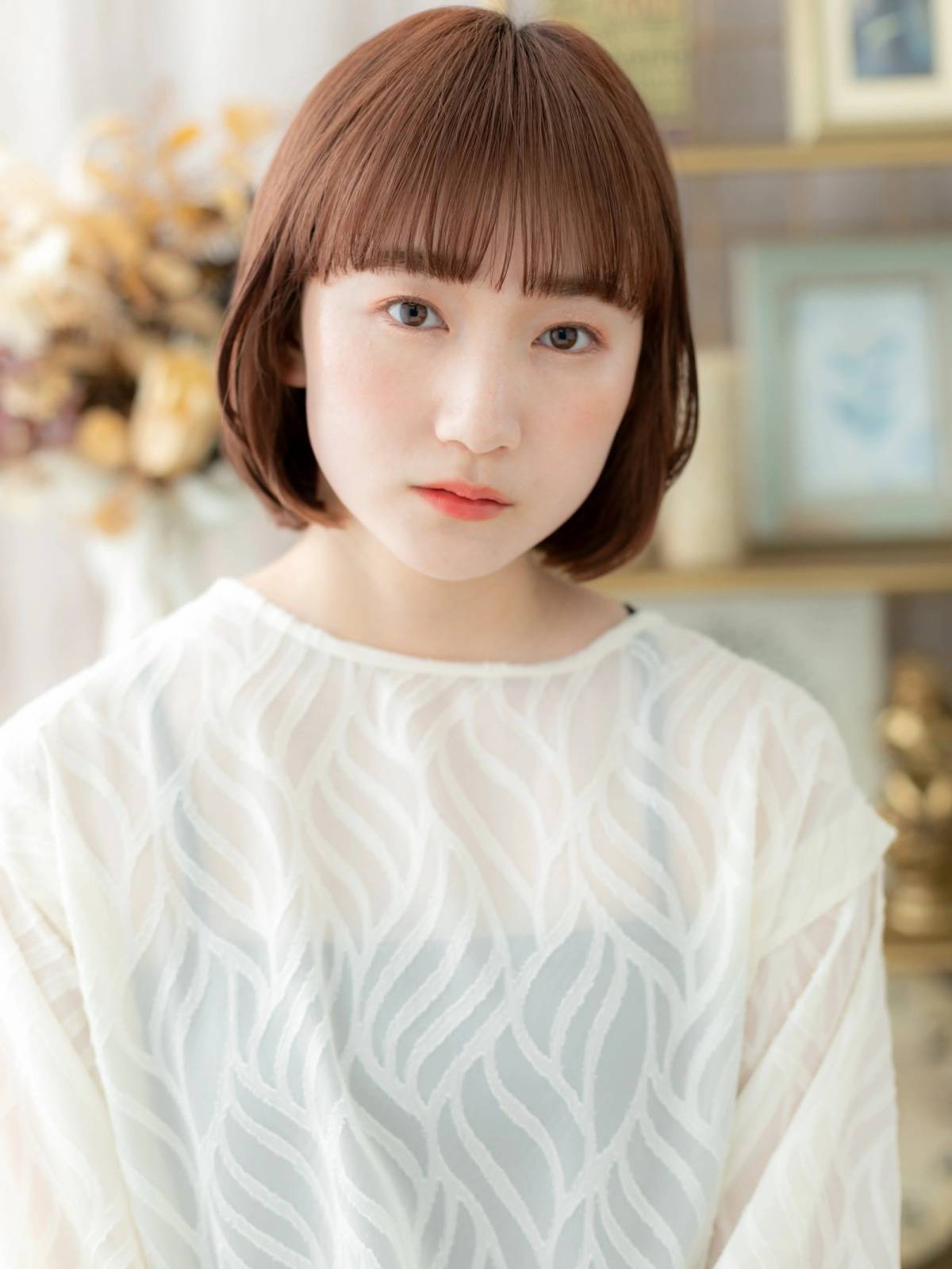 ぱっつん前髪のガーリーボブ