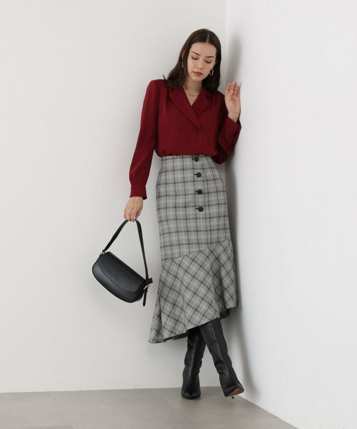 秋コーデの女性