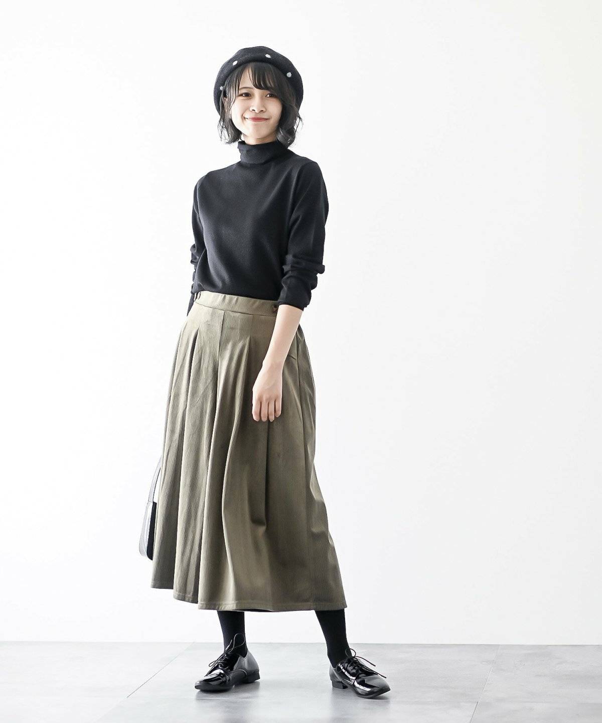 秋コーデの女性