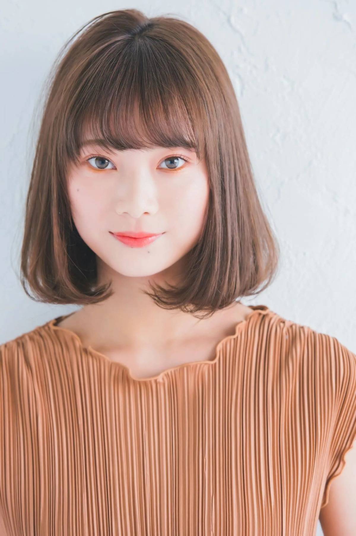 フェミニンワンカールボブ