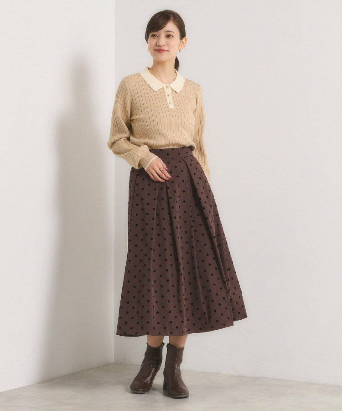 ポロシャツを着た女性