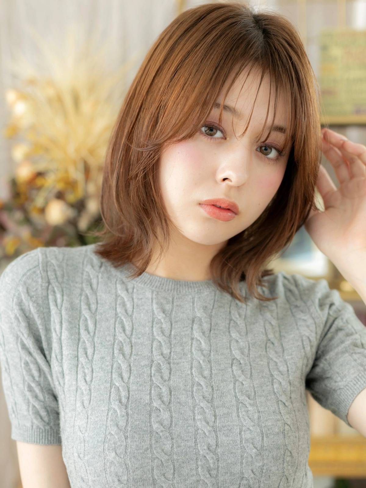 暖色カラーのくびれロングボブ