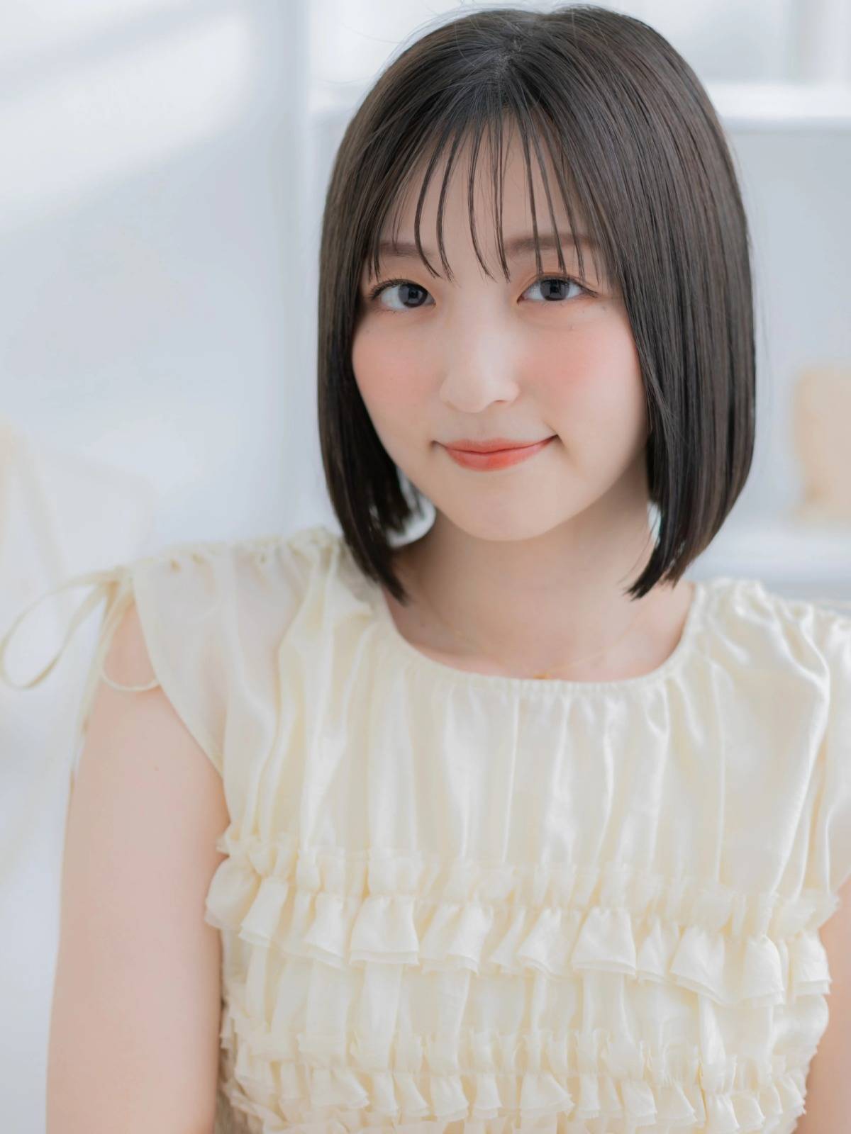 アッシュブラックカラーのツヤボブ