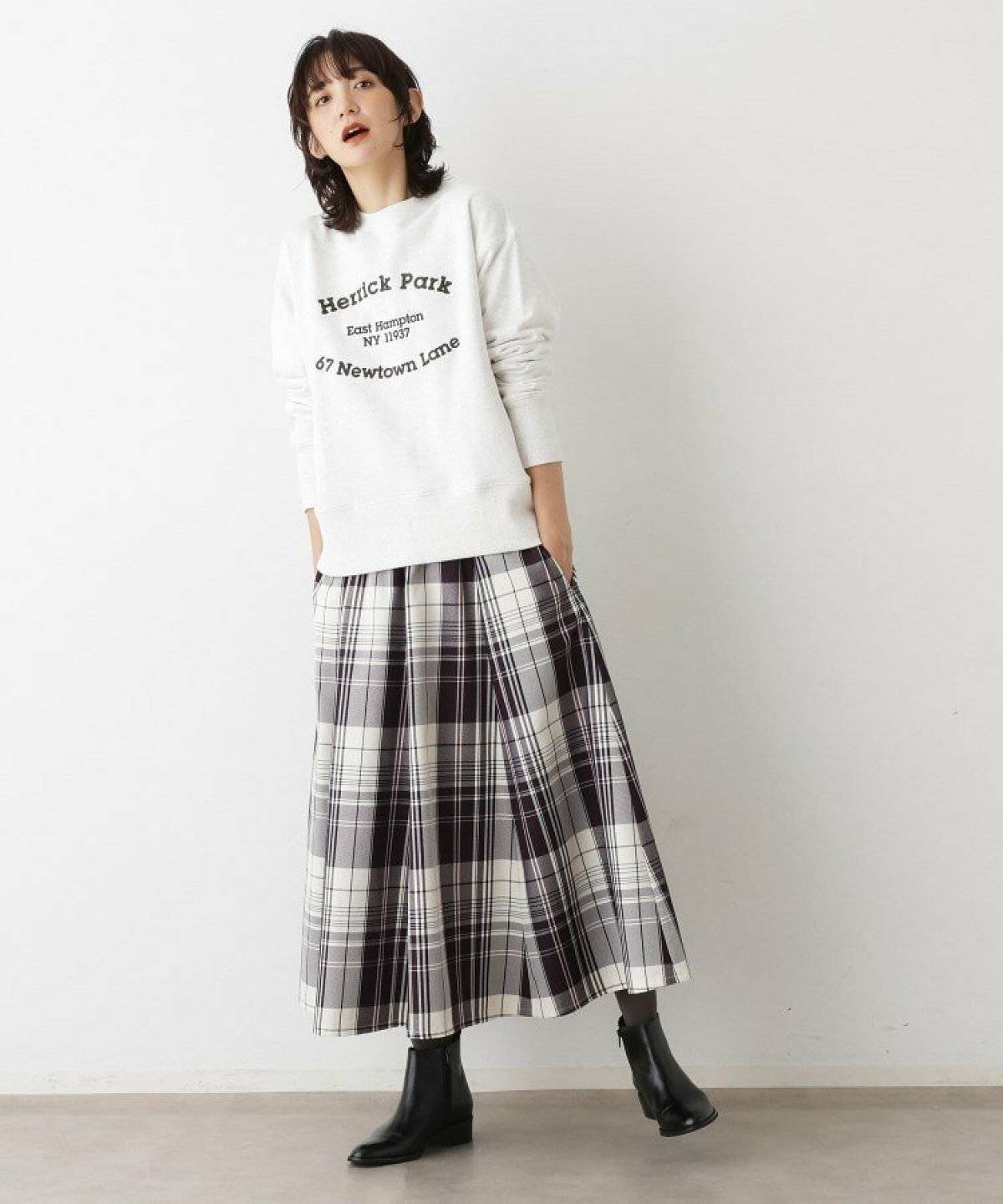 スウェットを着た女性