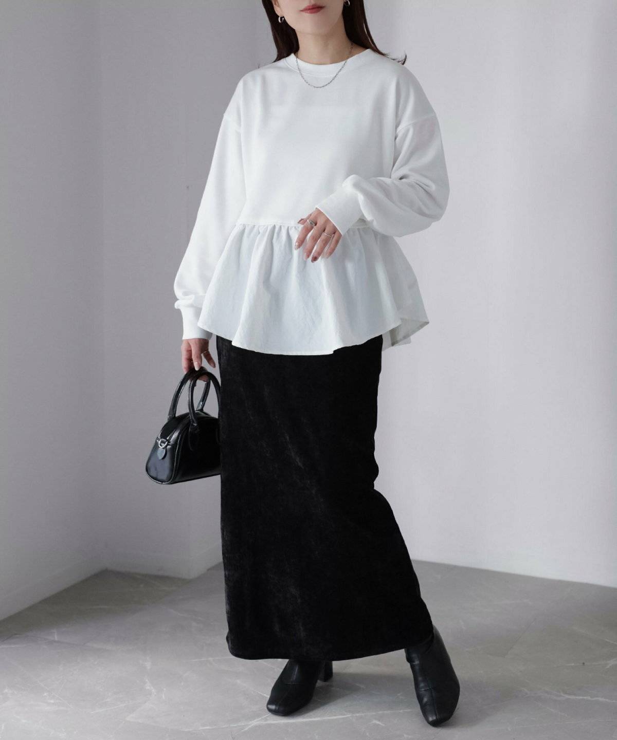 スウェットを着た女性