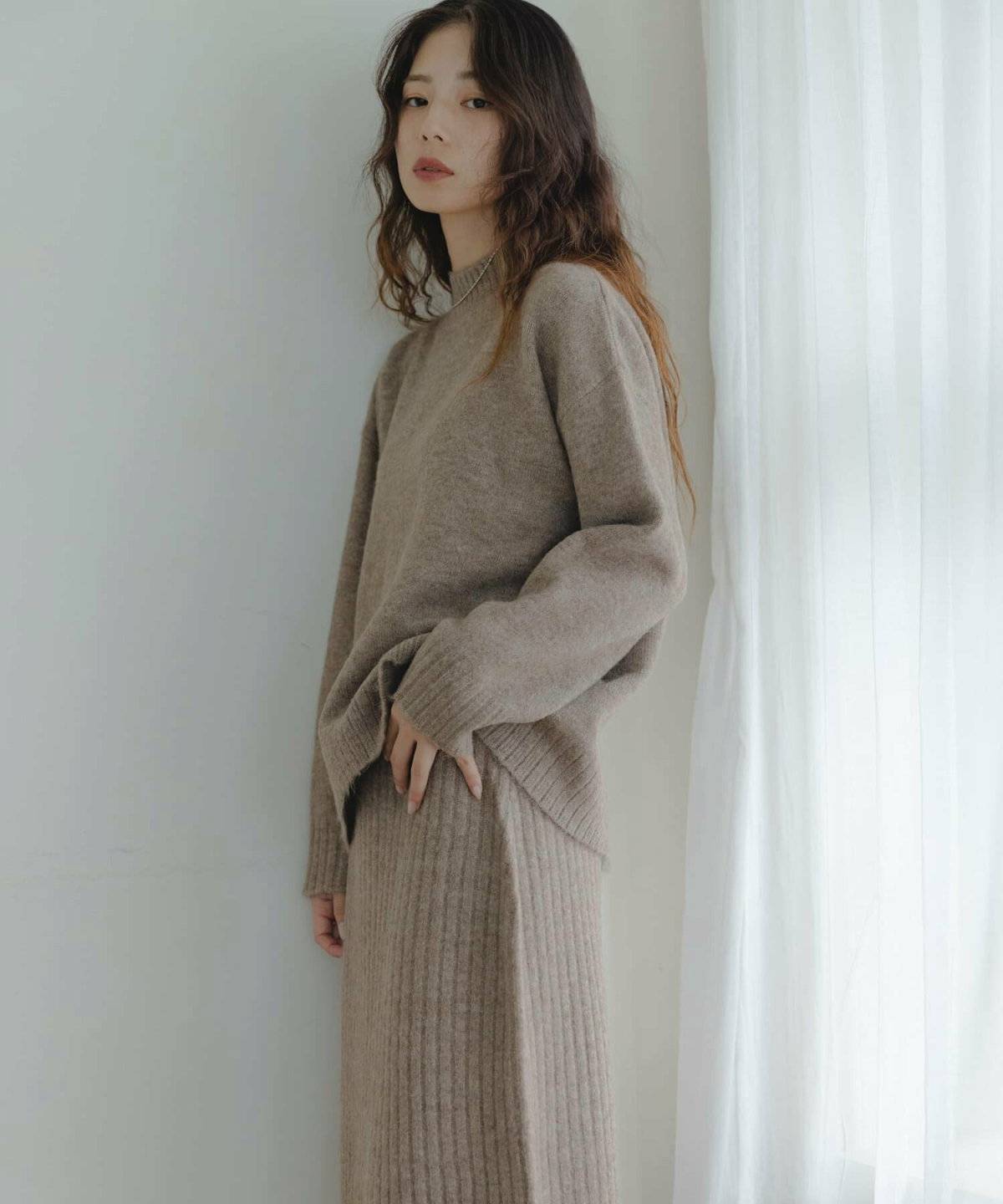 前だけインコーデの女性