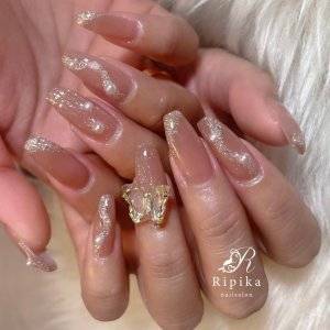  オレンジピンクネイル 