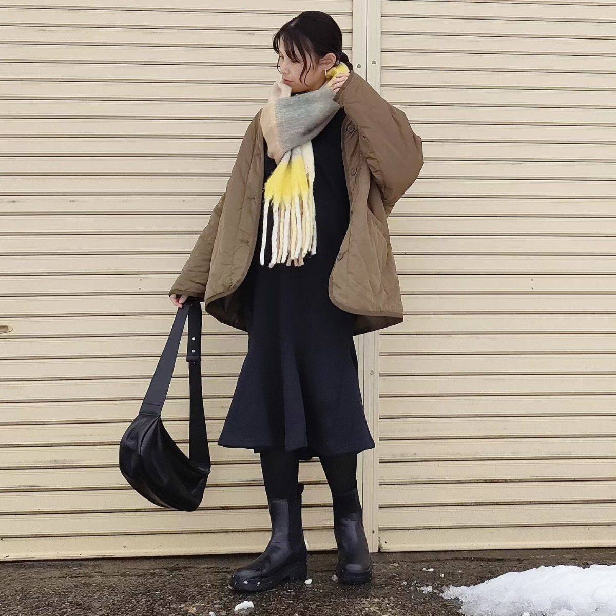 チェック柄マフラーをアクセントに♪