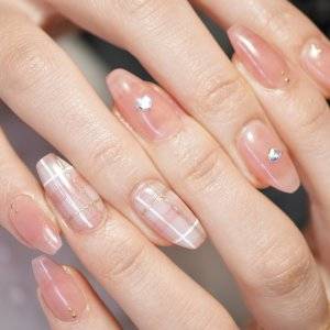 【2025年冬】マネるだけで即垢抜けるよ。最新ピーチピンクネイル5選