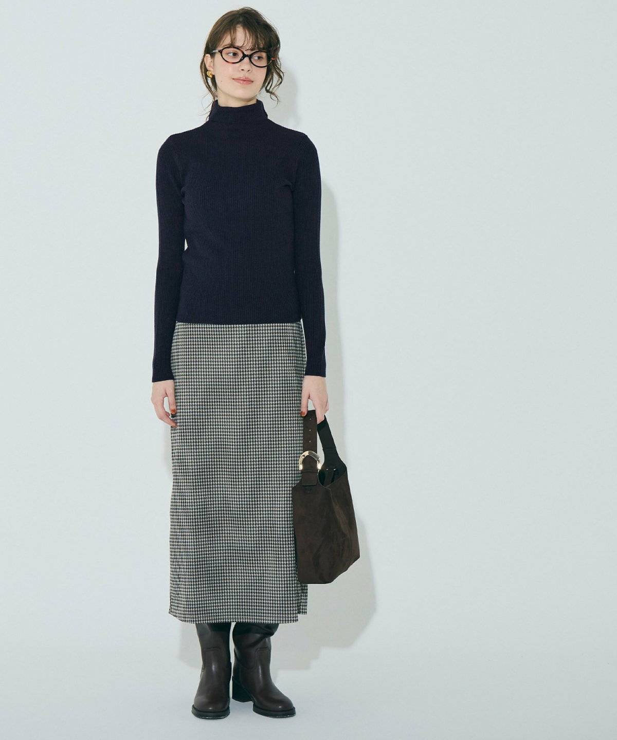 タートルネックを着た女性