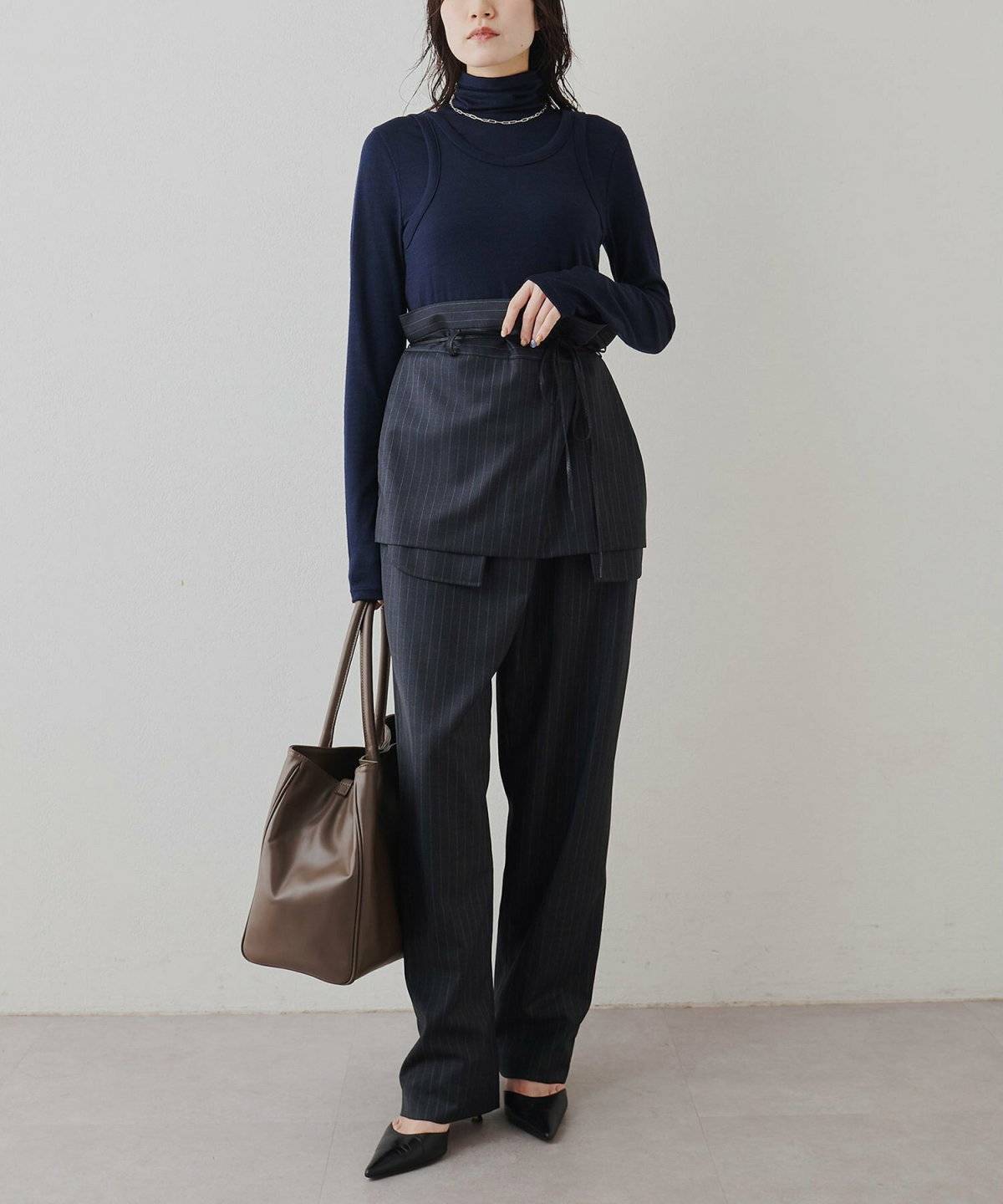 タートルネックを着た女性