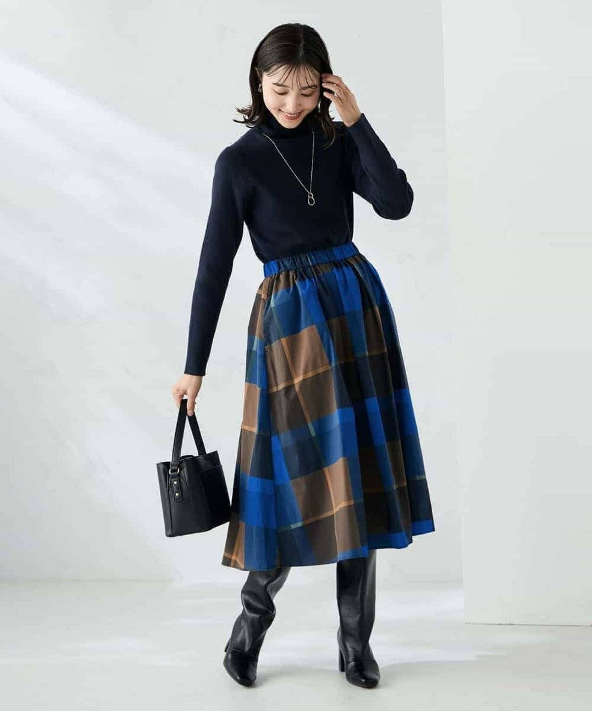 タートルネックを着た女性