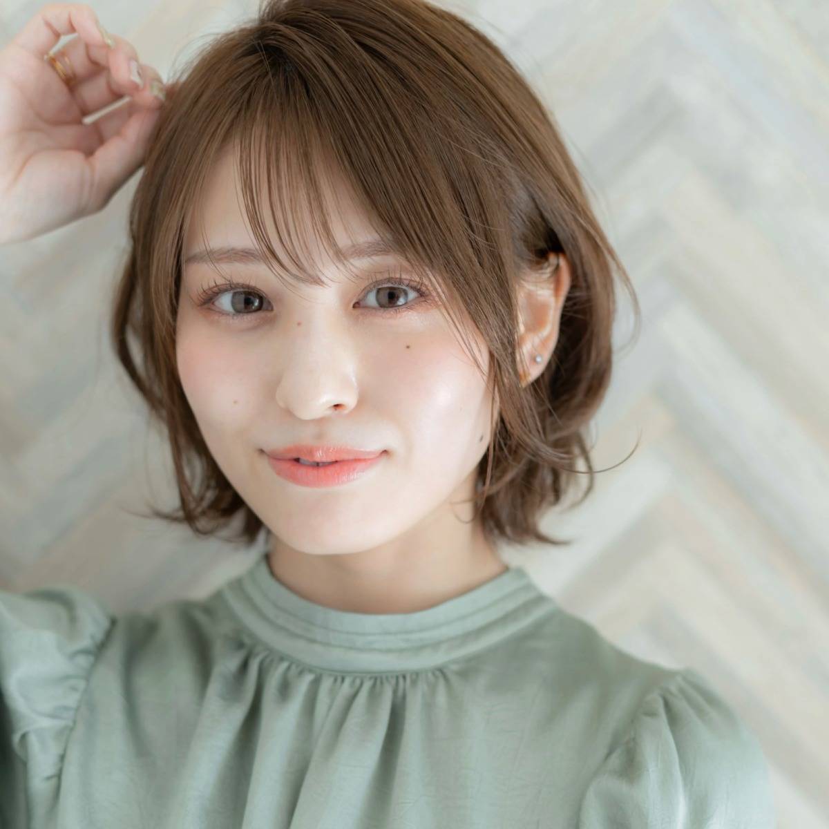 フェミニンなゆるパーマボブ