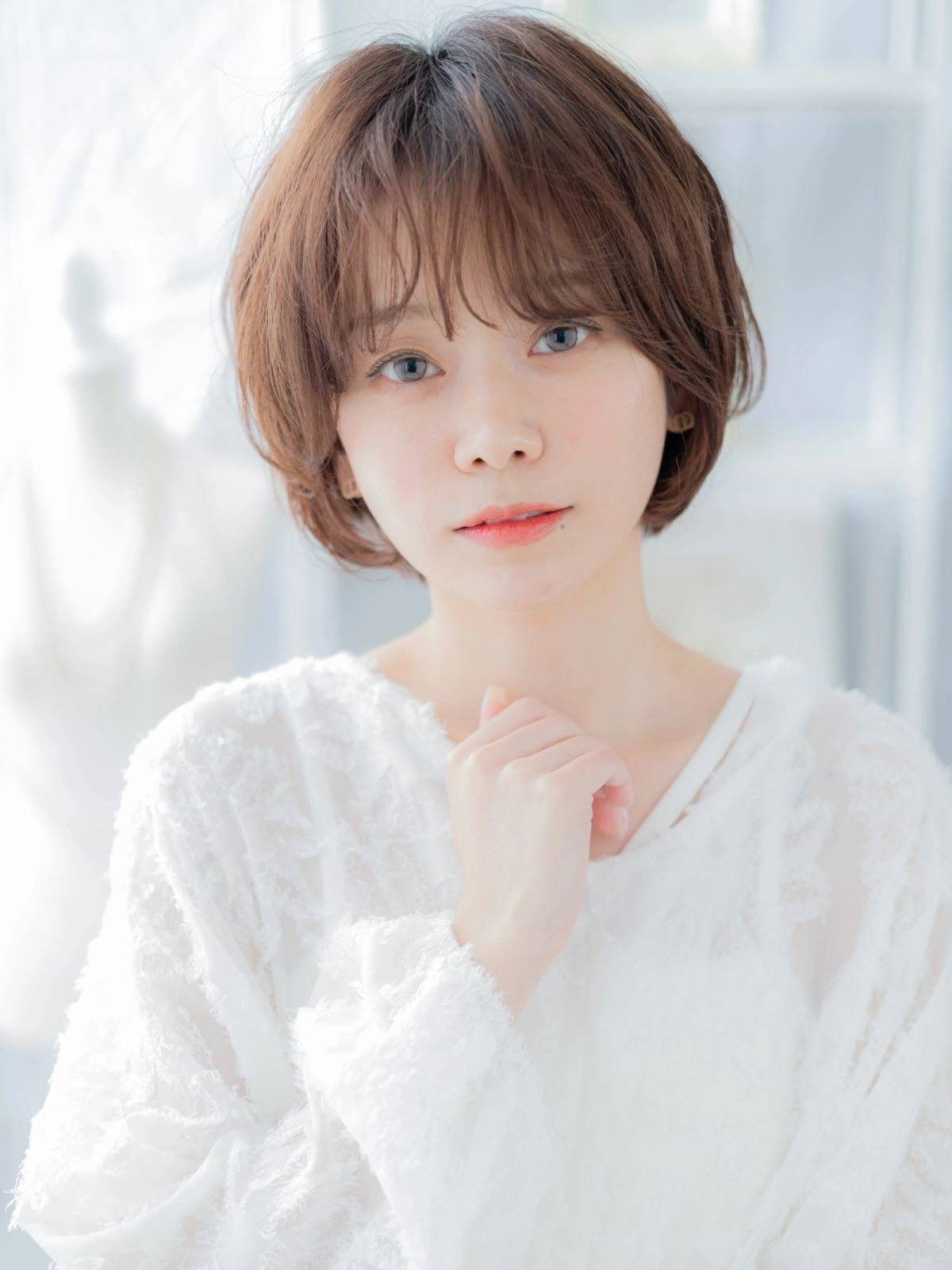 ゆるパーマのフェミニンショート