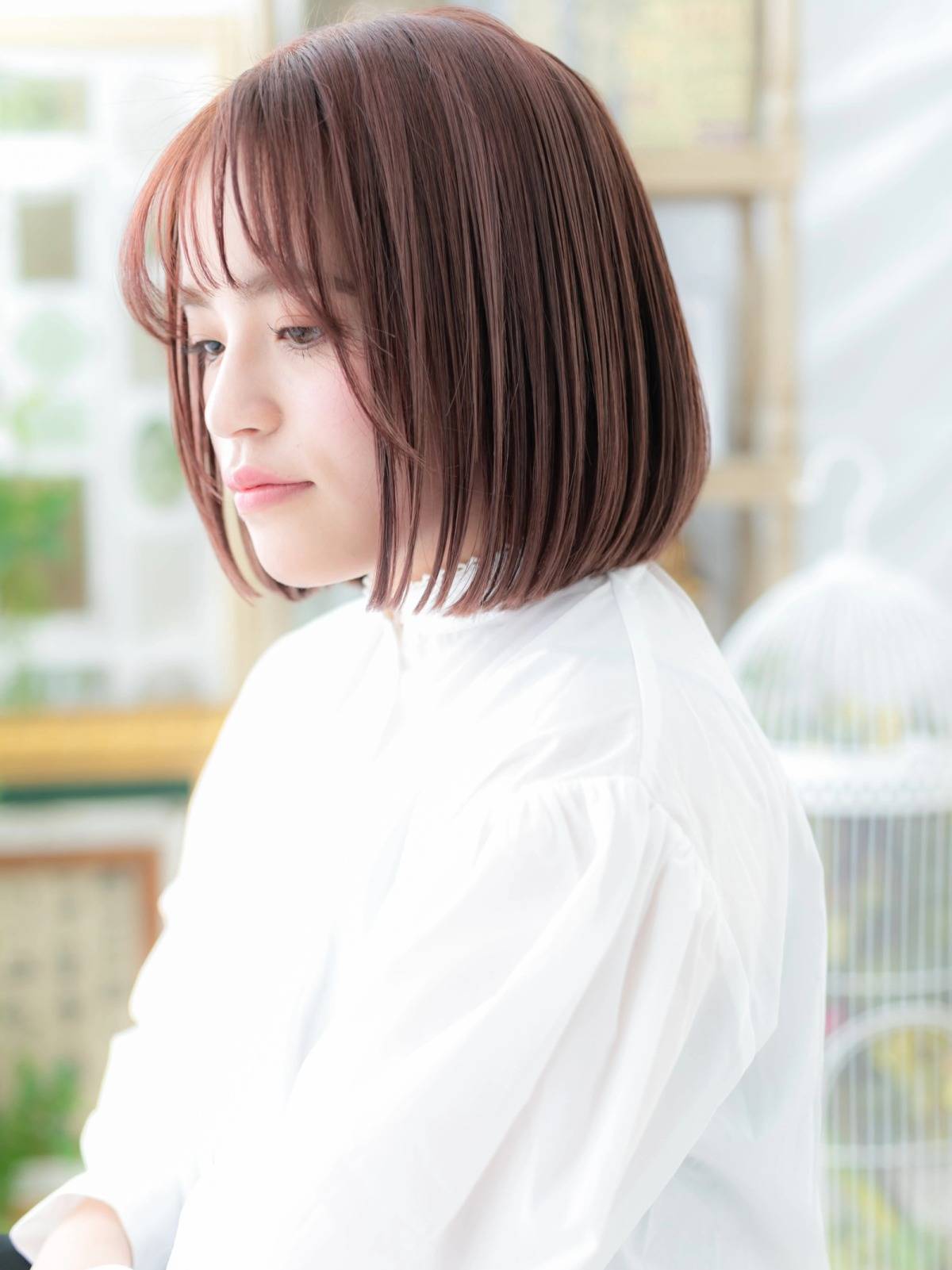 血色感をプラスできる暖色カラーボブ