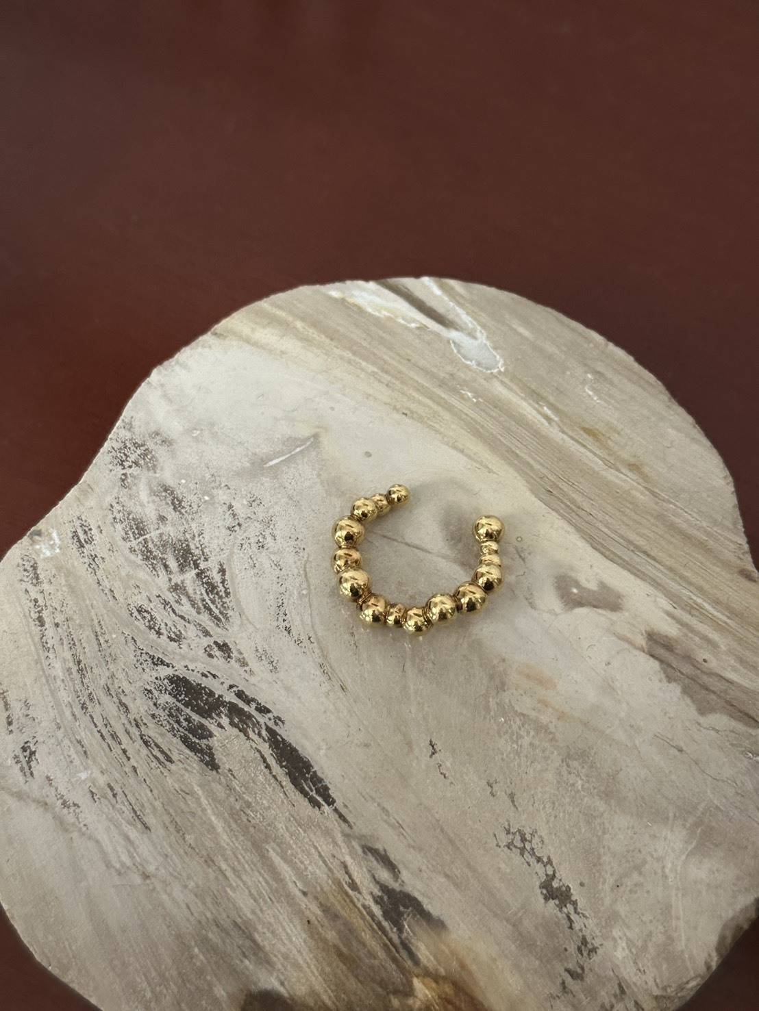 ゴールドのパール型リング