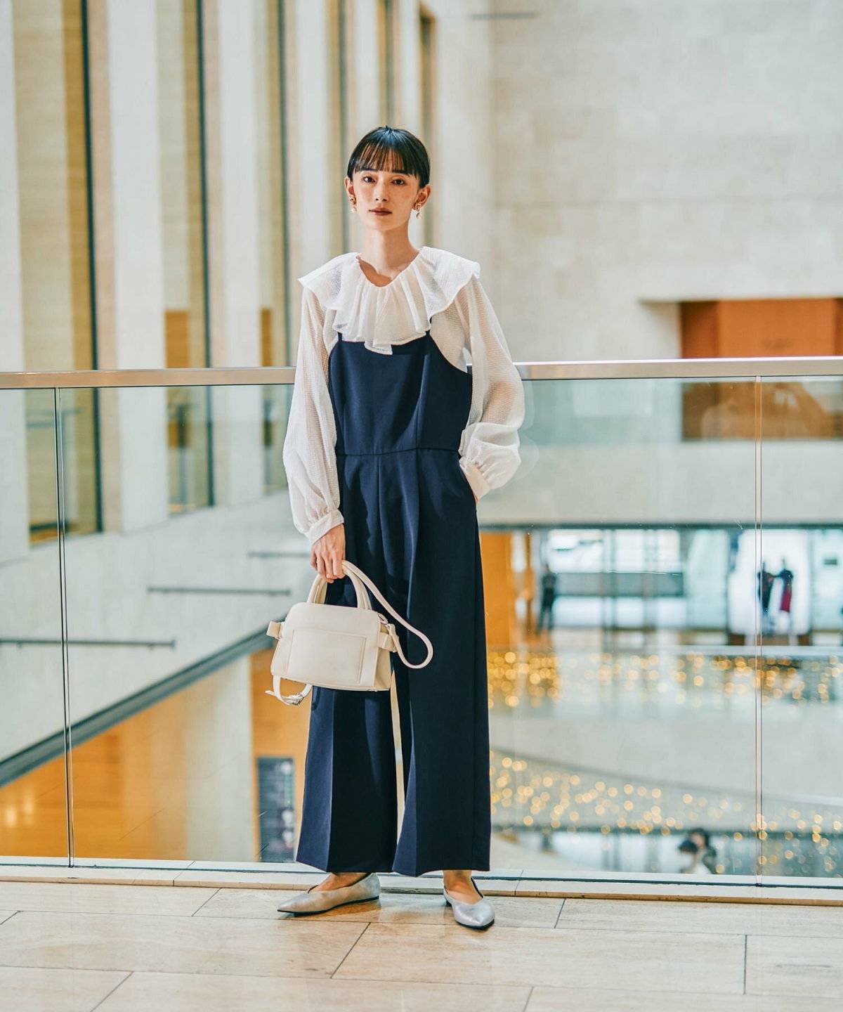 春コーデの女性