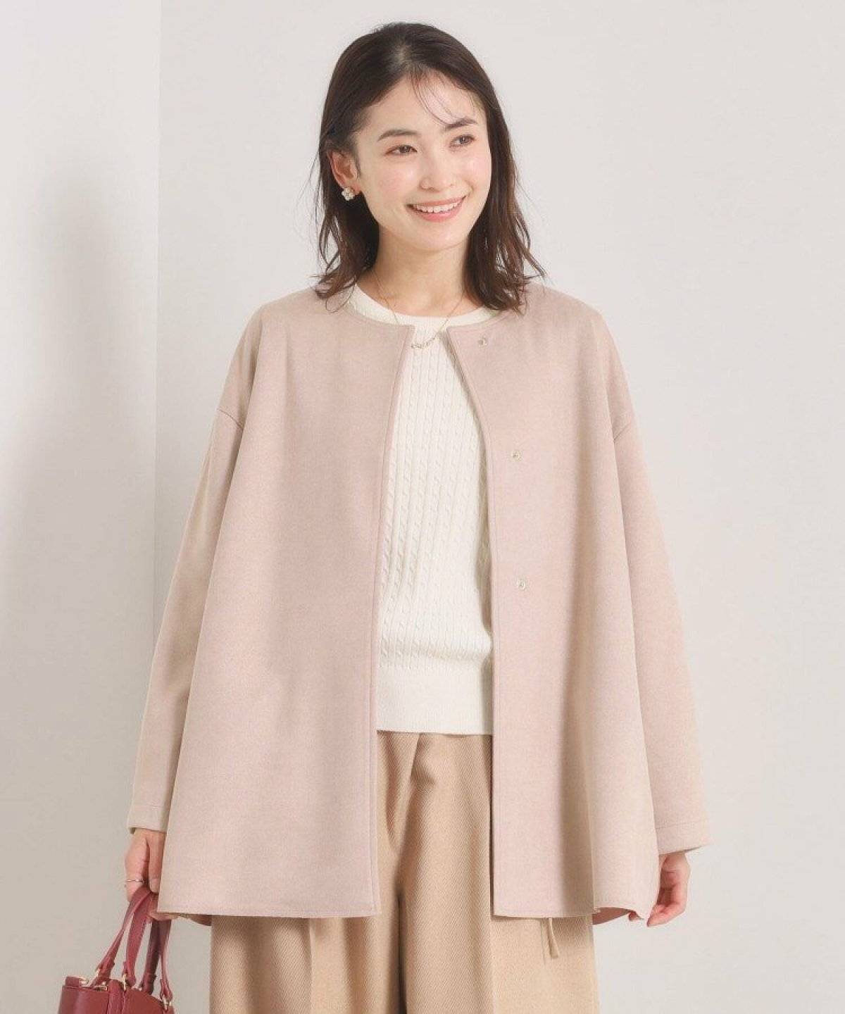 コートを着た女性