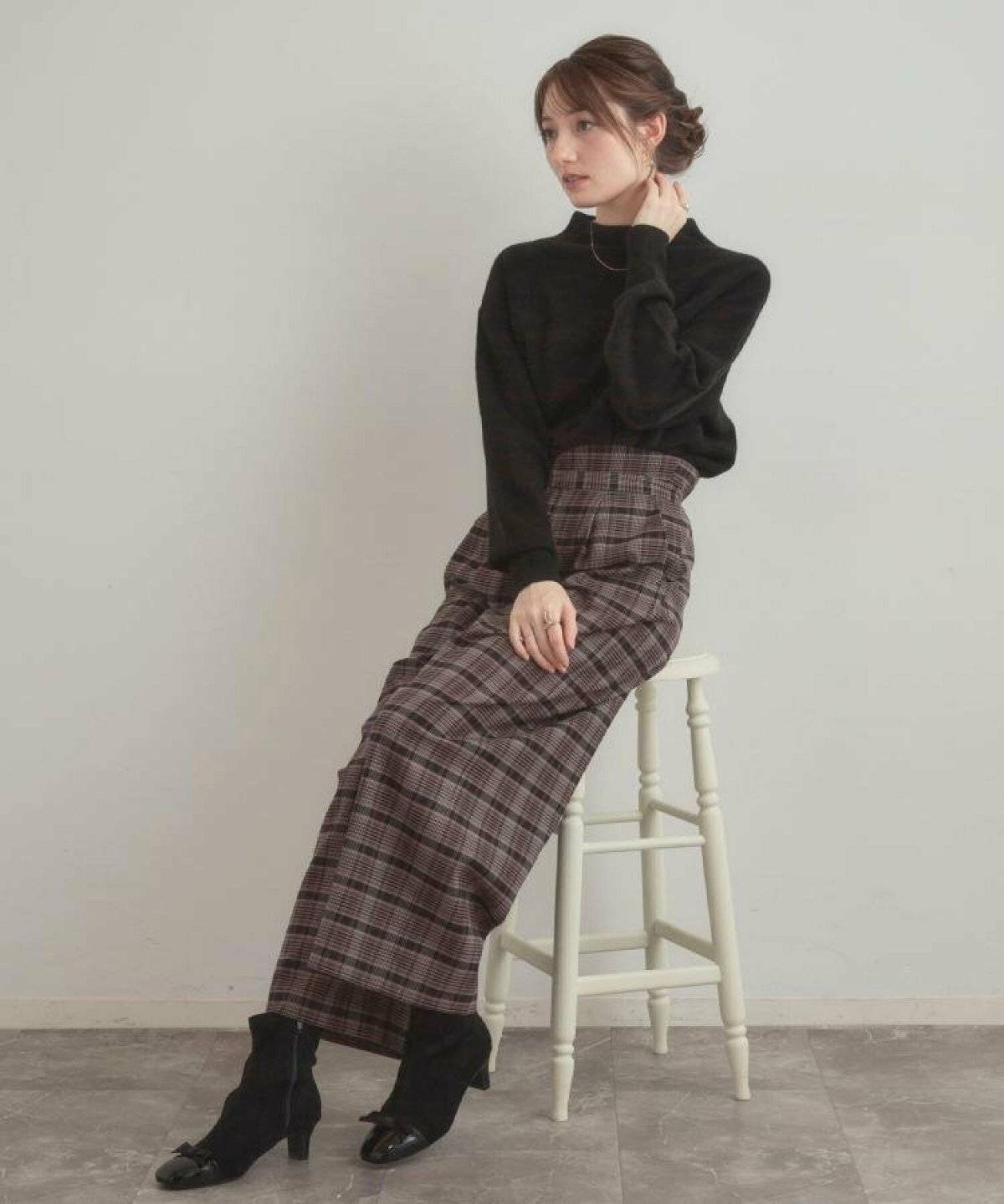 パンツコーデの女性