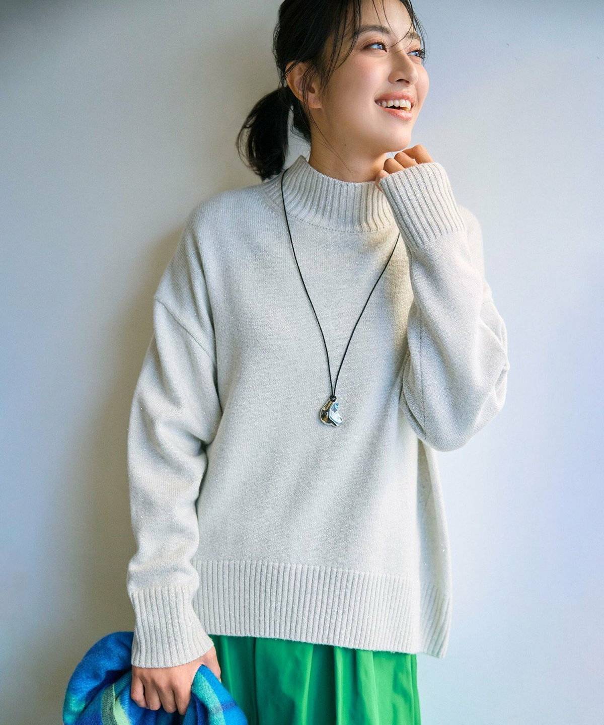 春コーデの女性