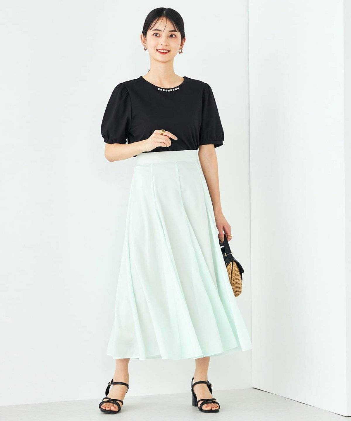 春コーデの女性