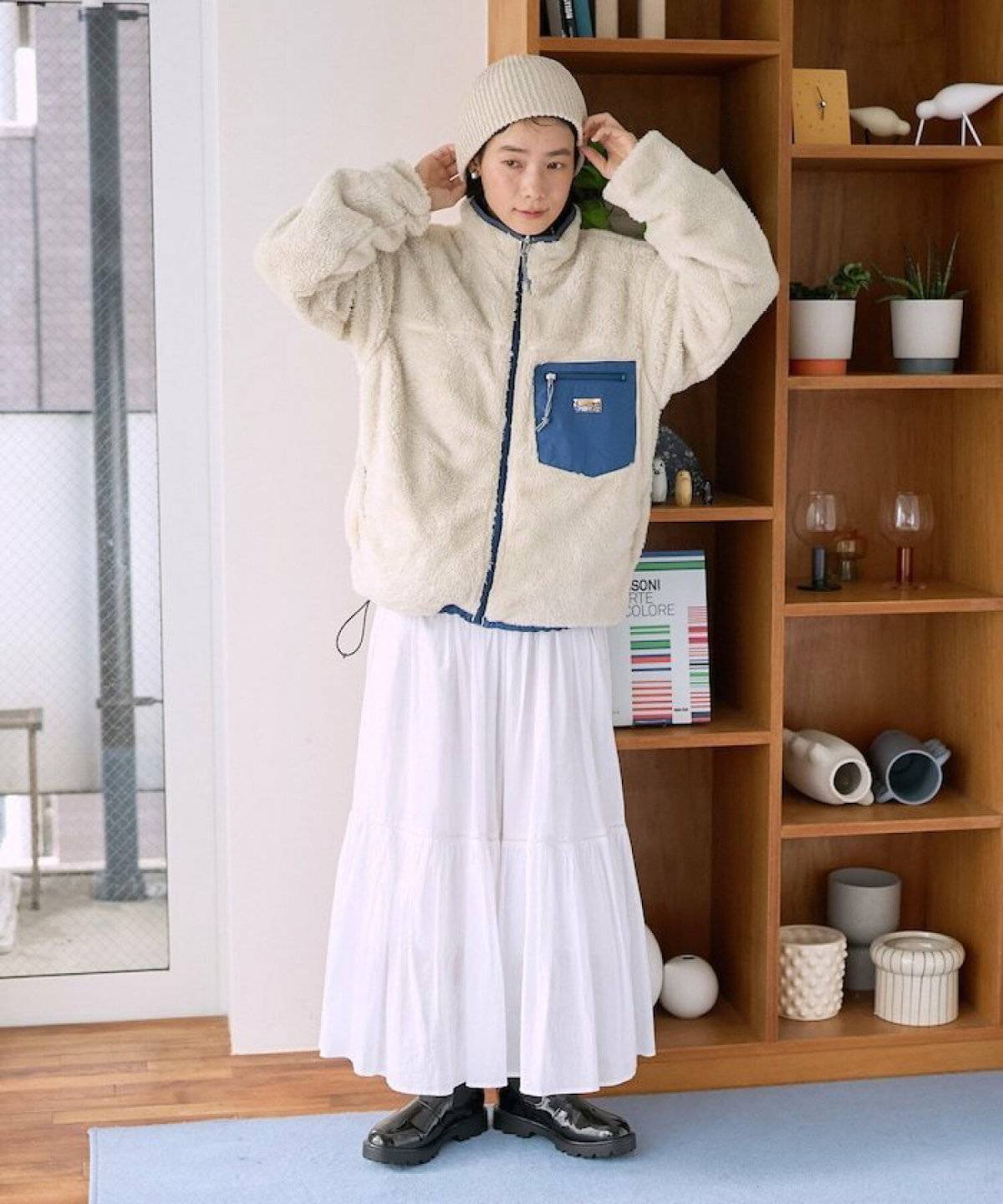 ベレー帽コーデの女性