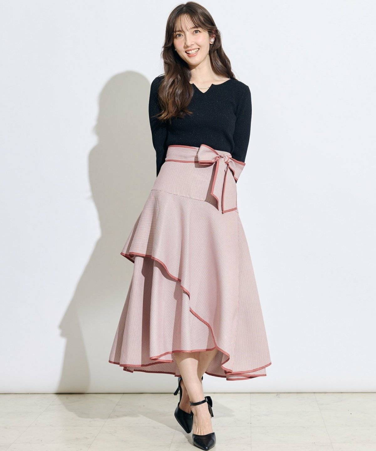 クラシカルコーデの女性