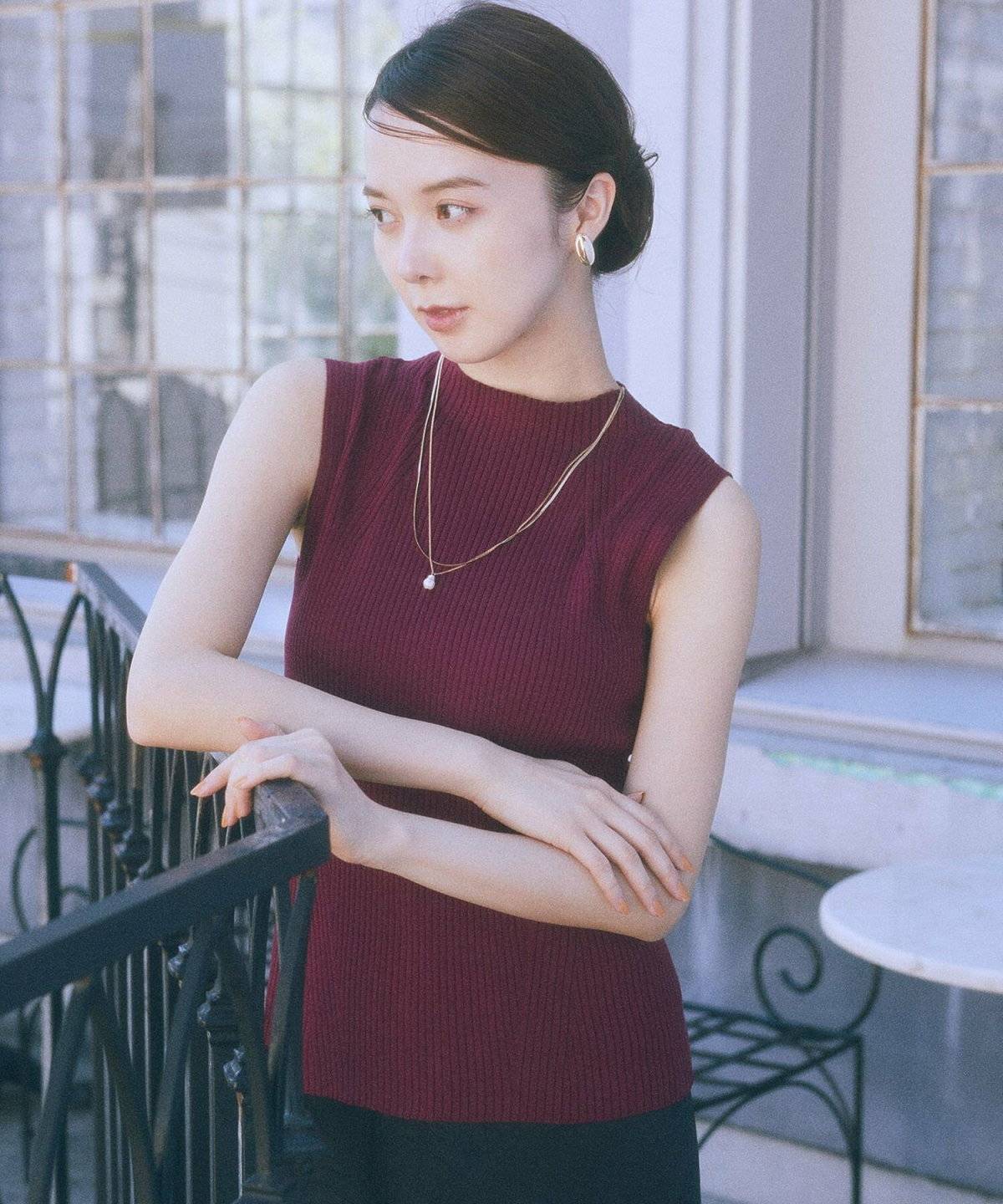 クラシカルコーデの女性