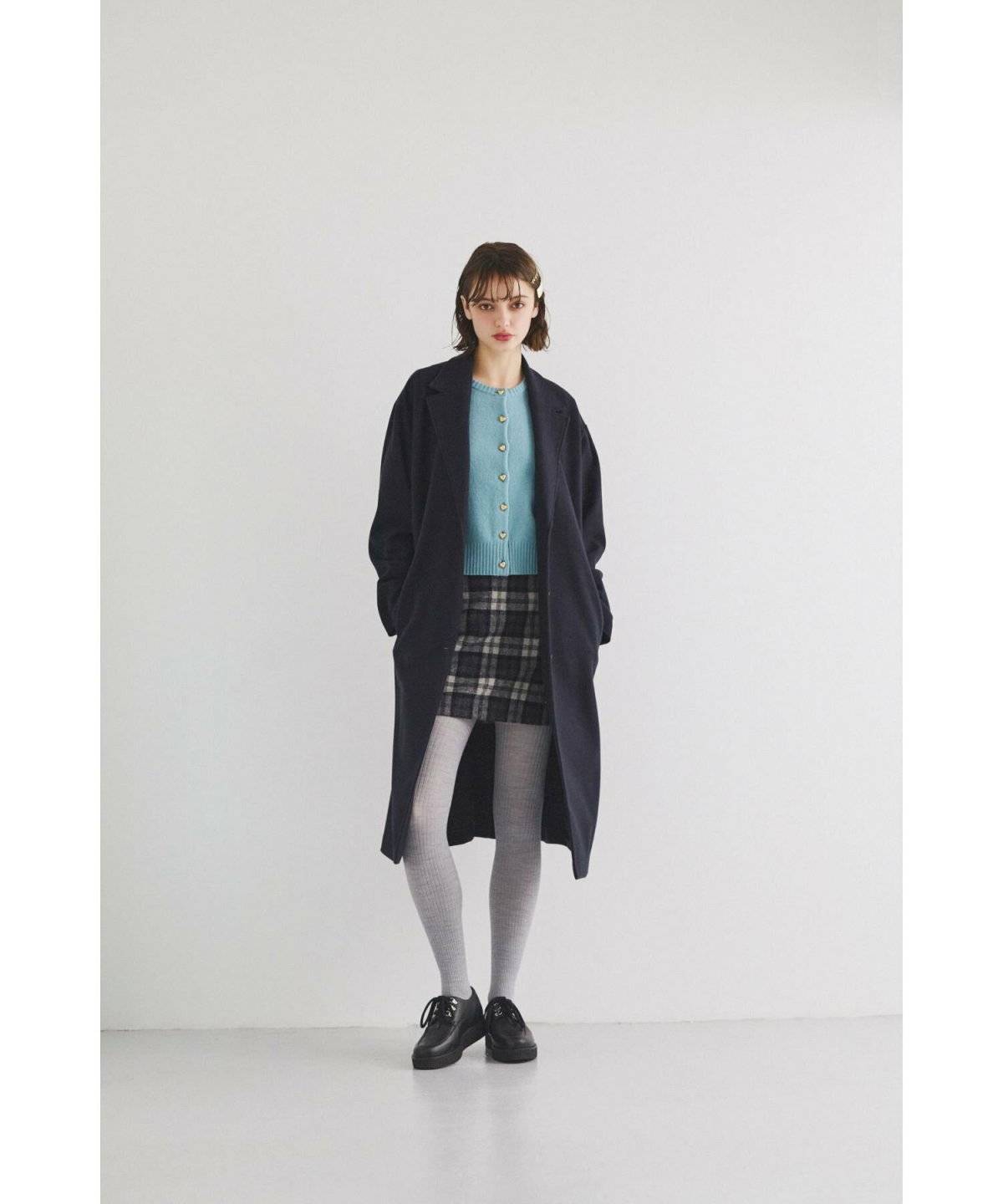 クラシカルコーデの女性