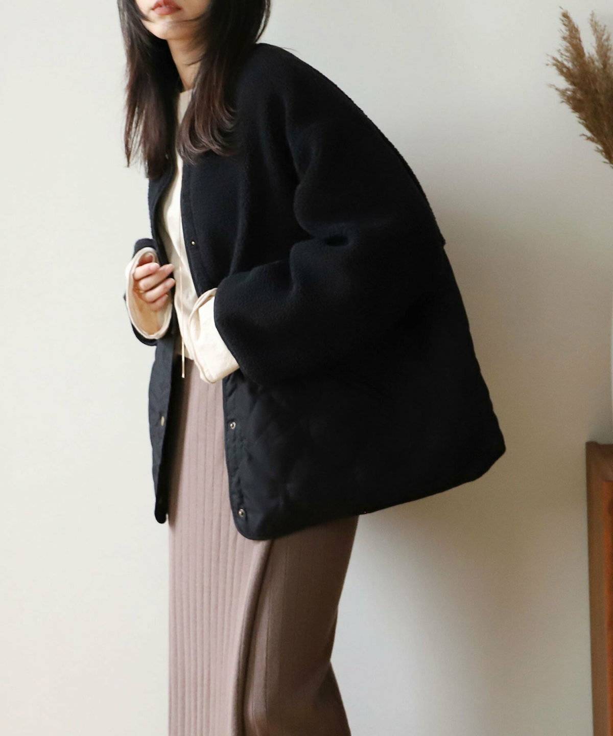 クラシカルコーデの女性