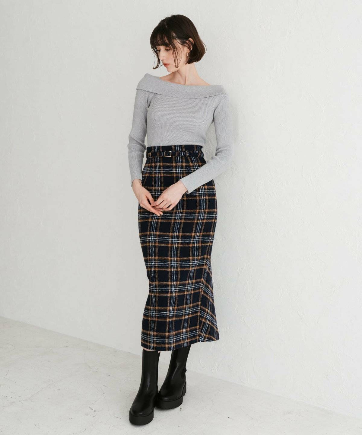 トラッドコーデの女性