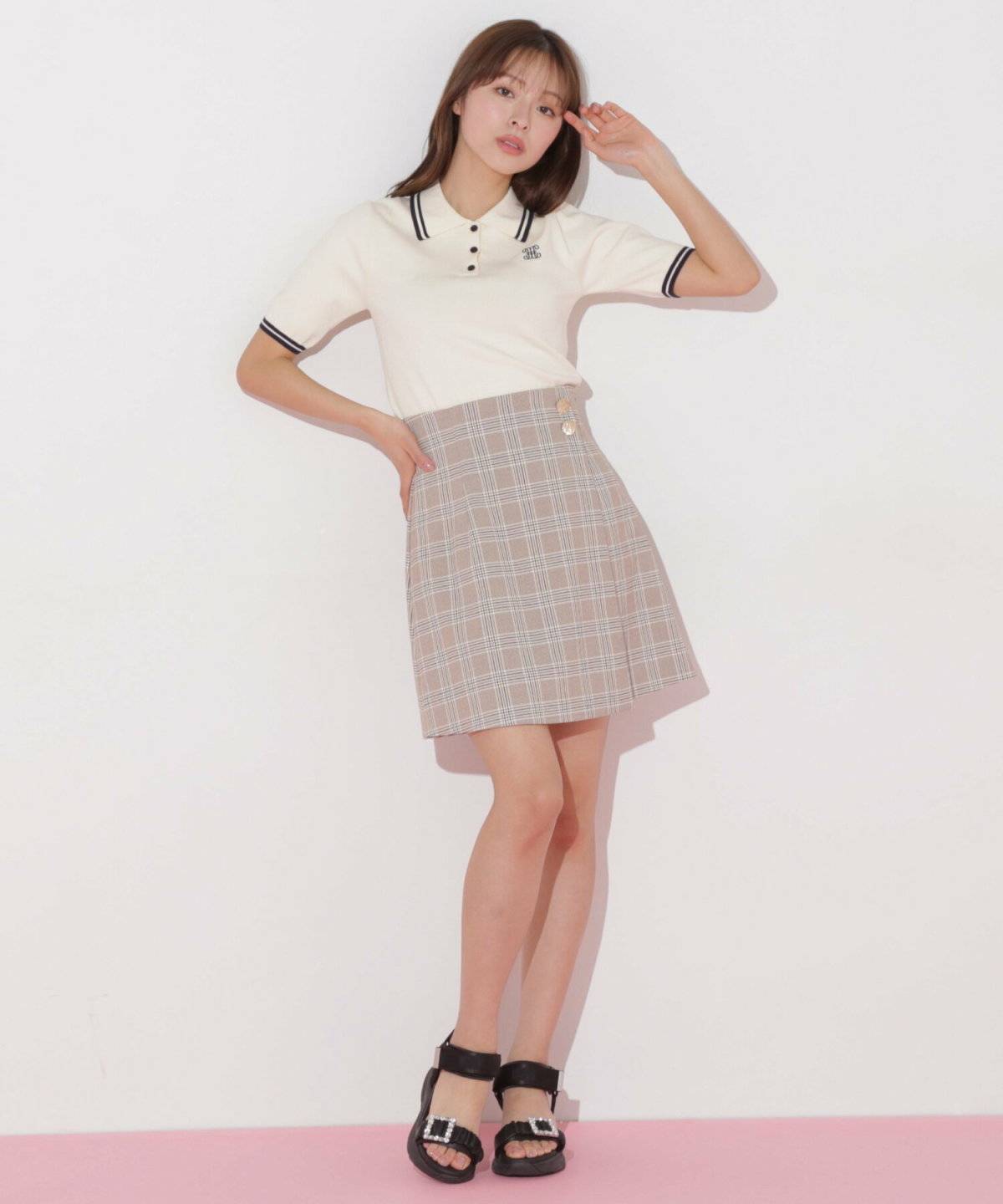 トラッドコーデの女性