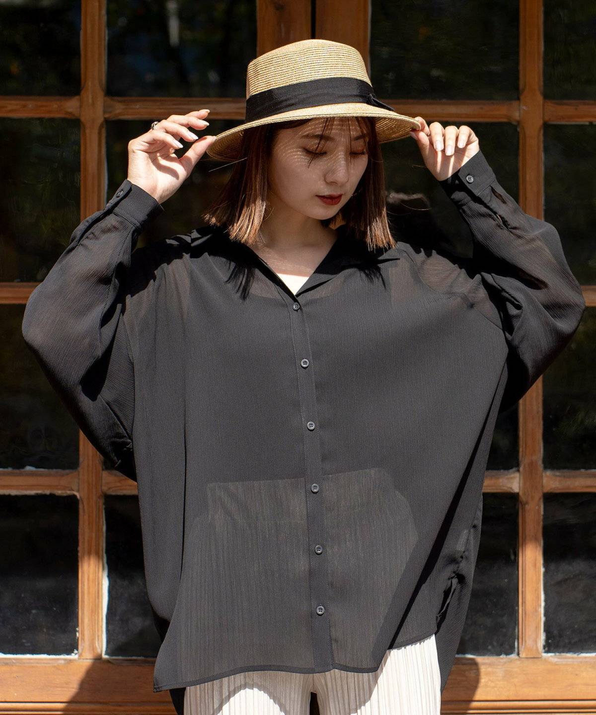 帽子をかぶった女性