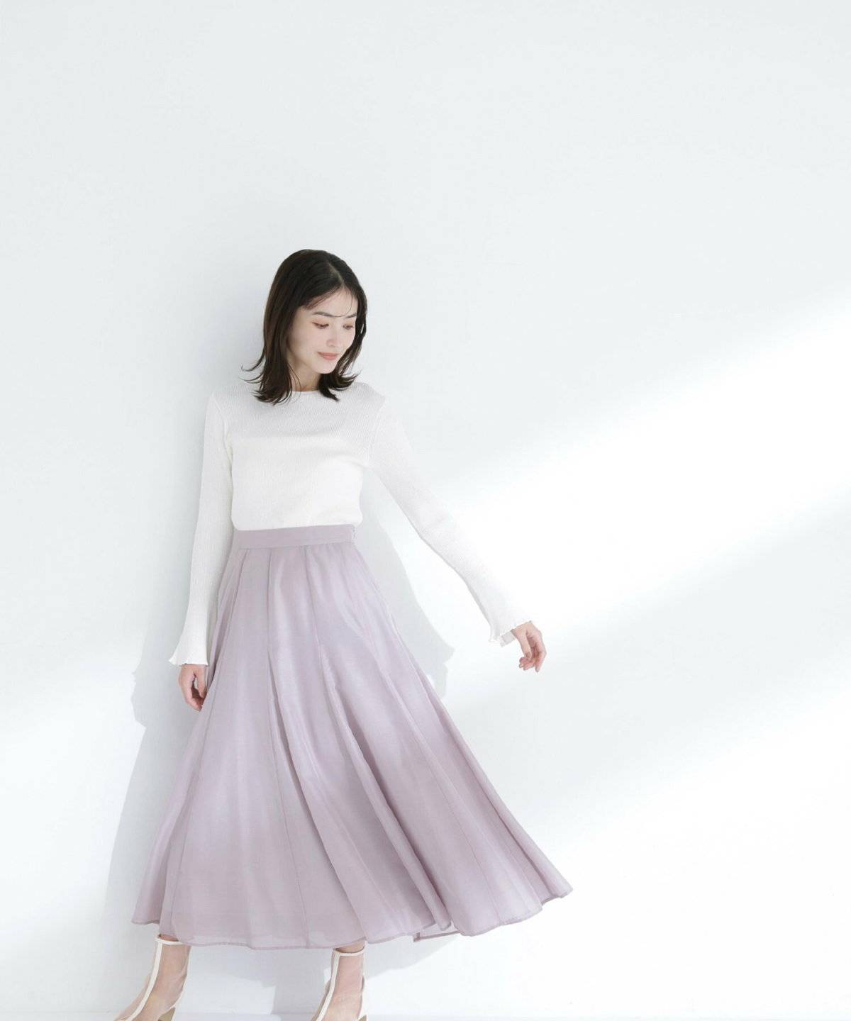 春コーデの女性