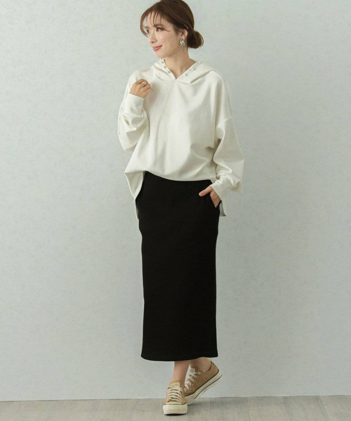 秋コーデの女性