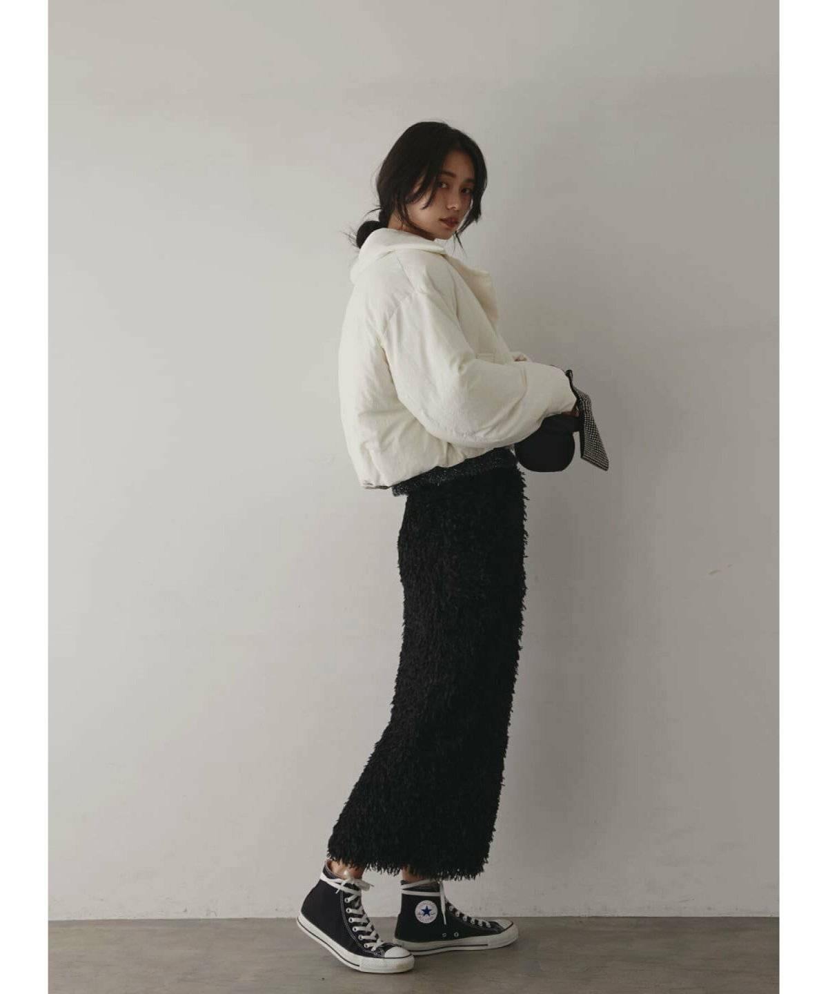 スポーティーコーデの女性