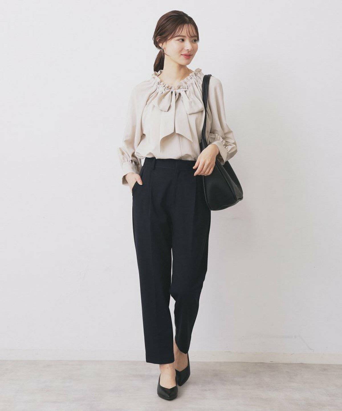 春コーデの女性